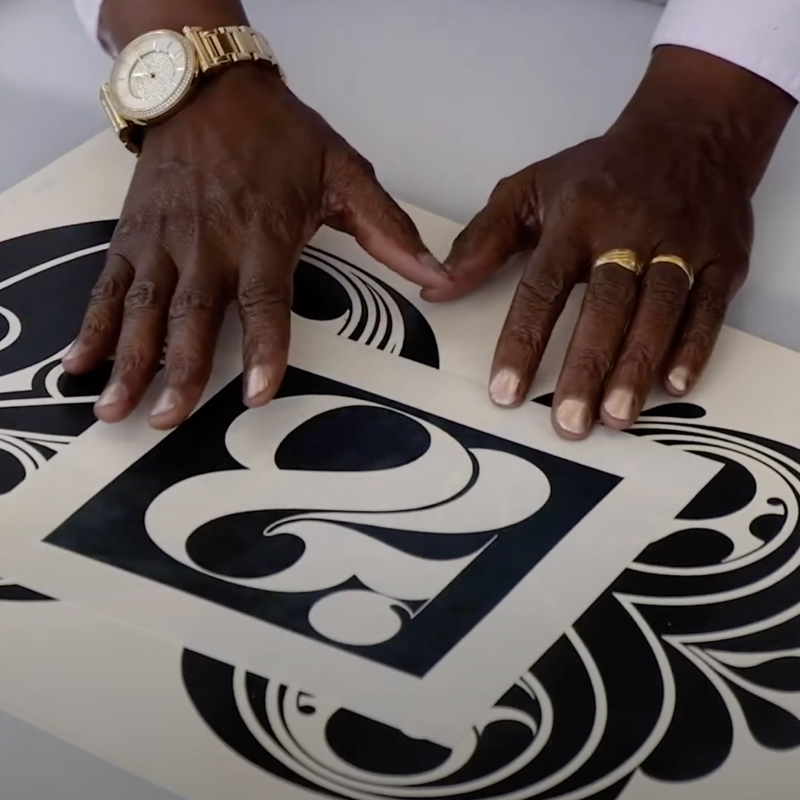 Righting Injustice cover image: Angela Bains explaining her work